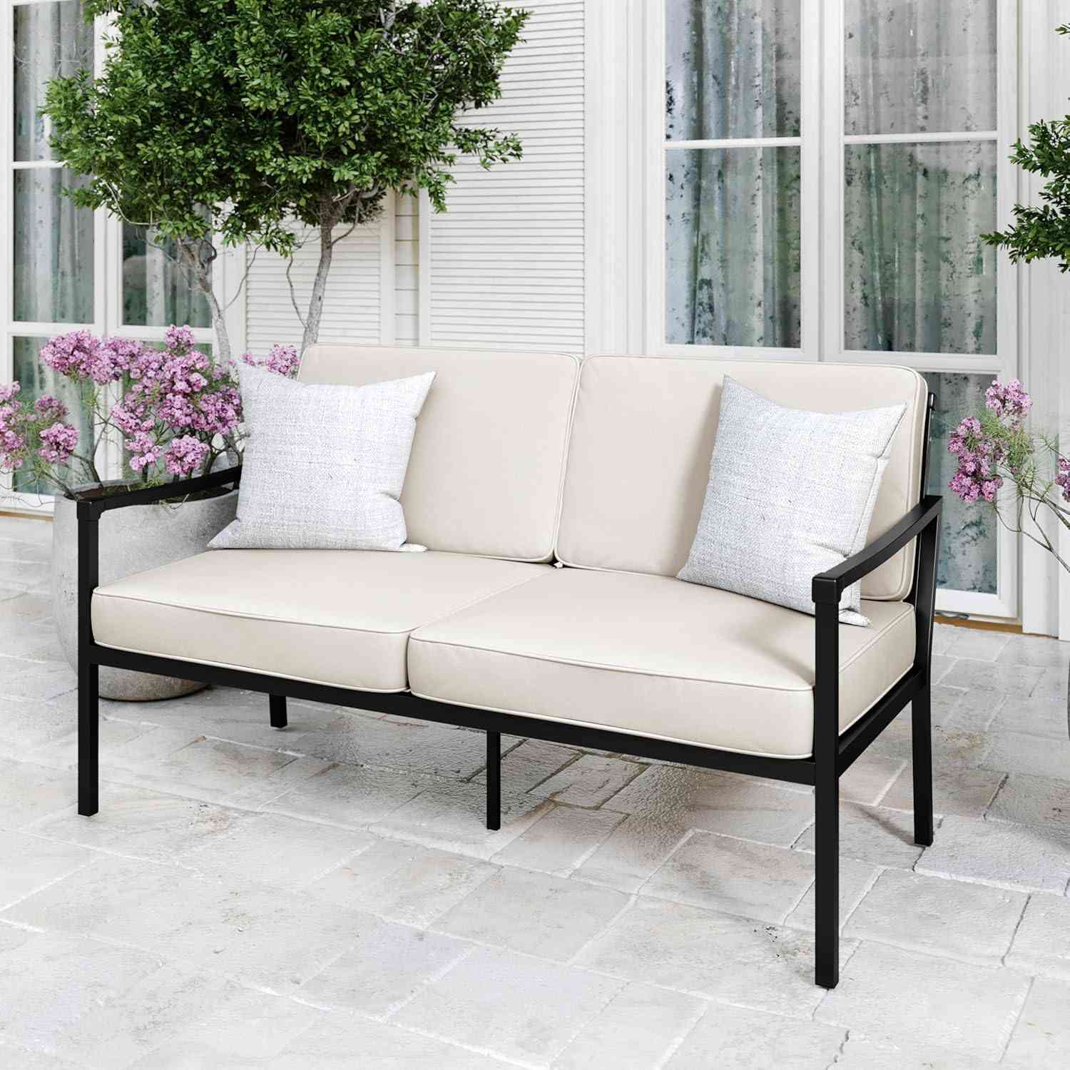 Loveseat with white cushions