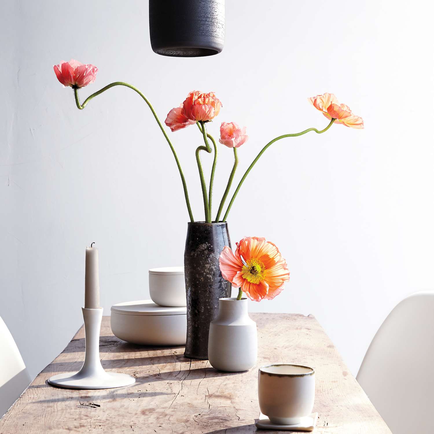 handmade ceramic vases on a dining table