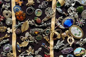 Collection of decorative pins and brooches on display