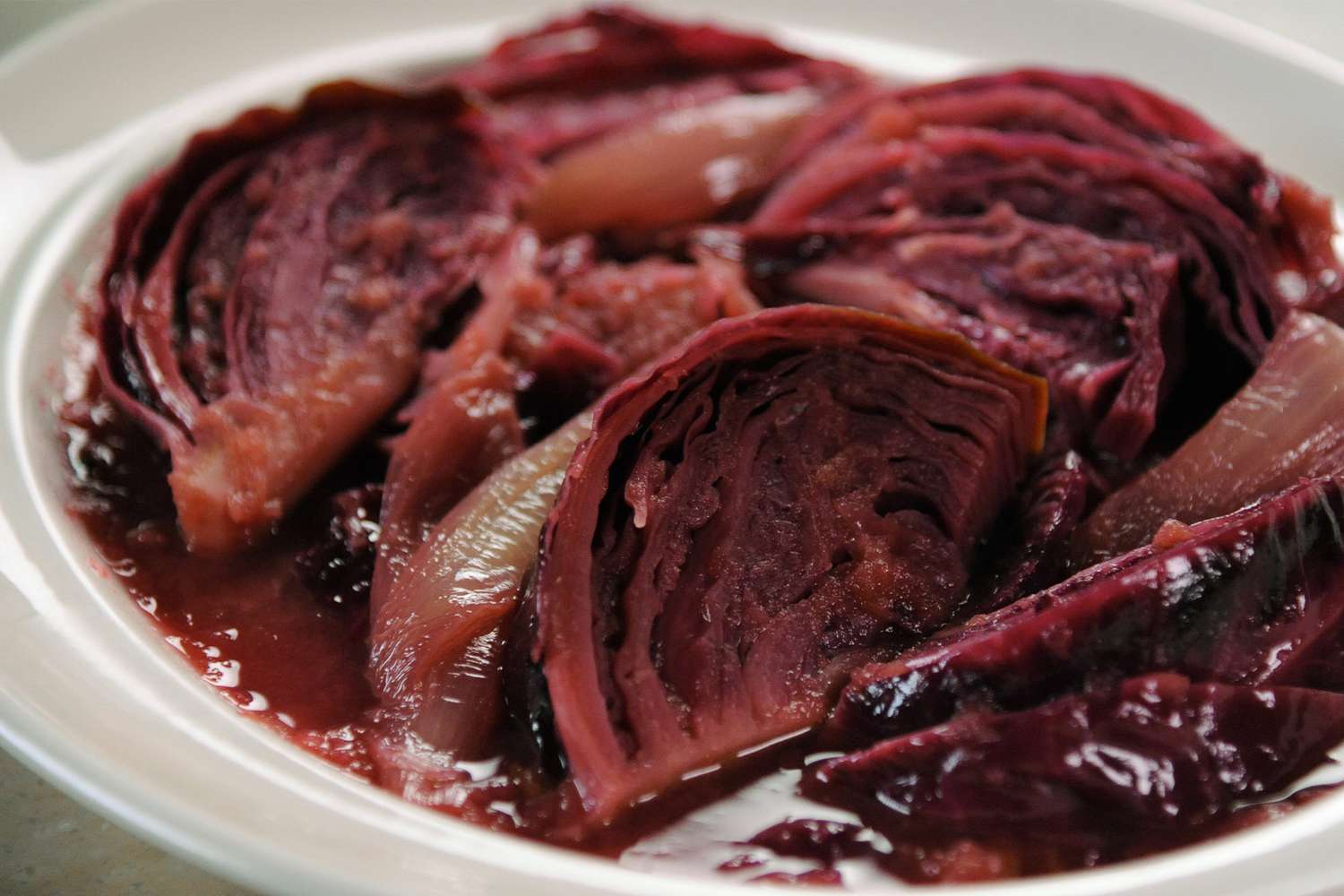 close up of braised red cabbage white dish