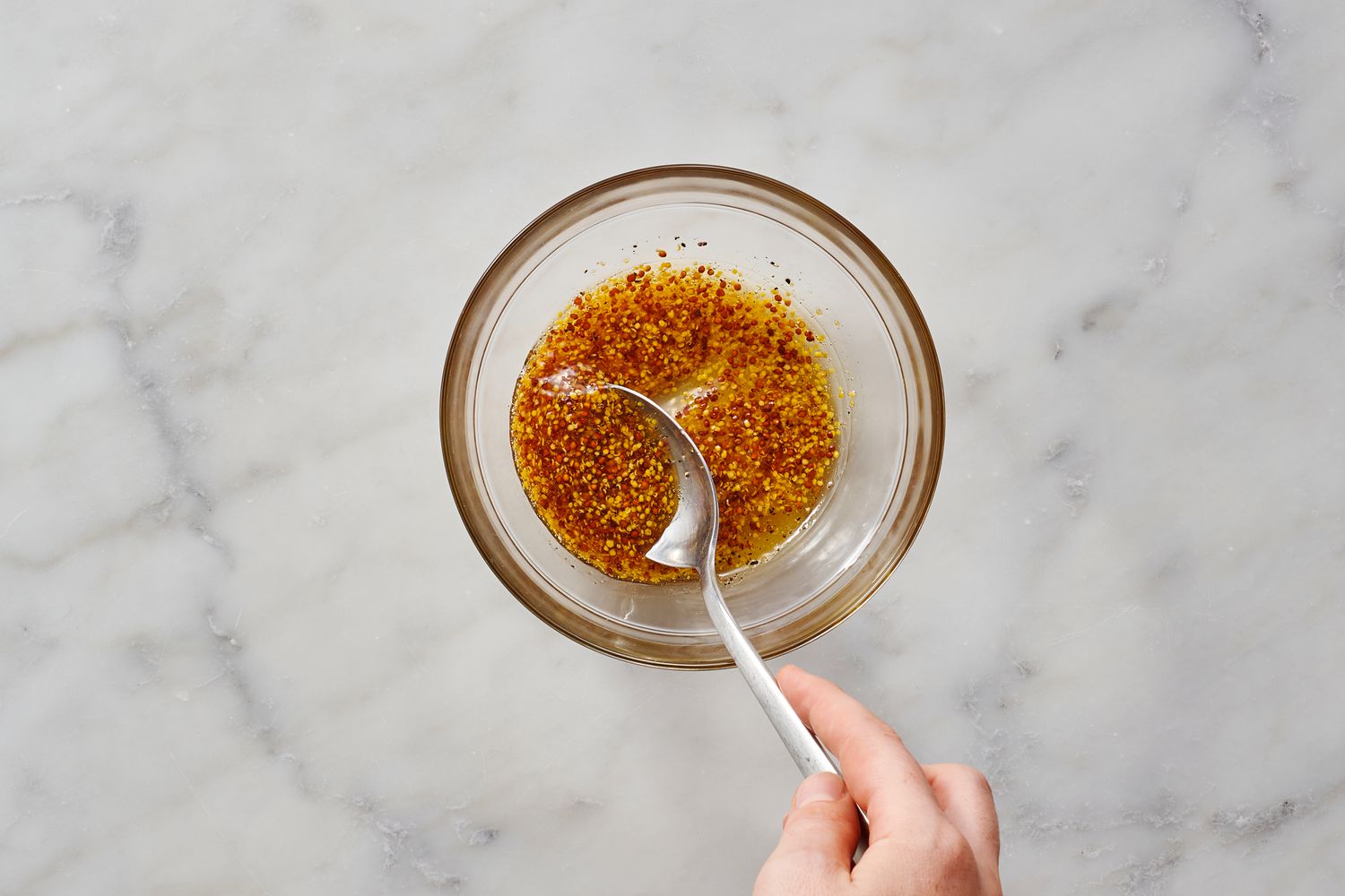 Mixing mustard and honey in a small bowl