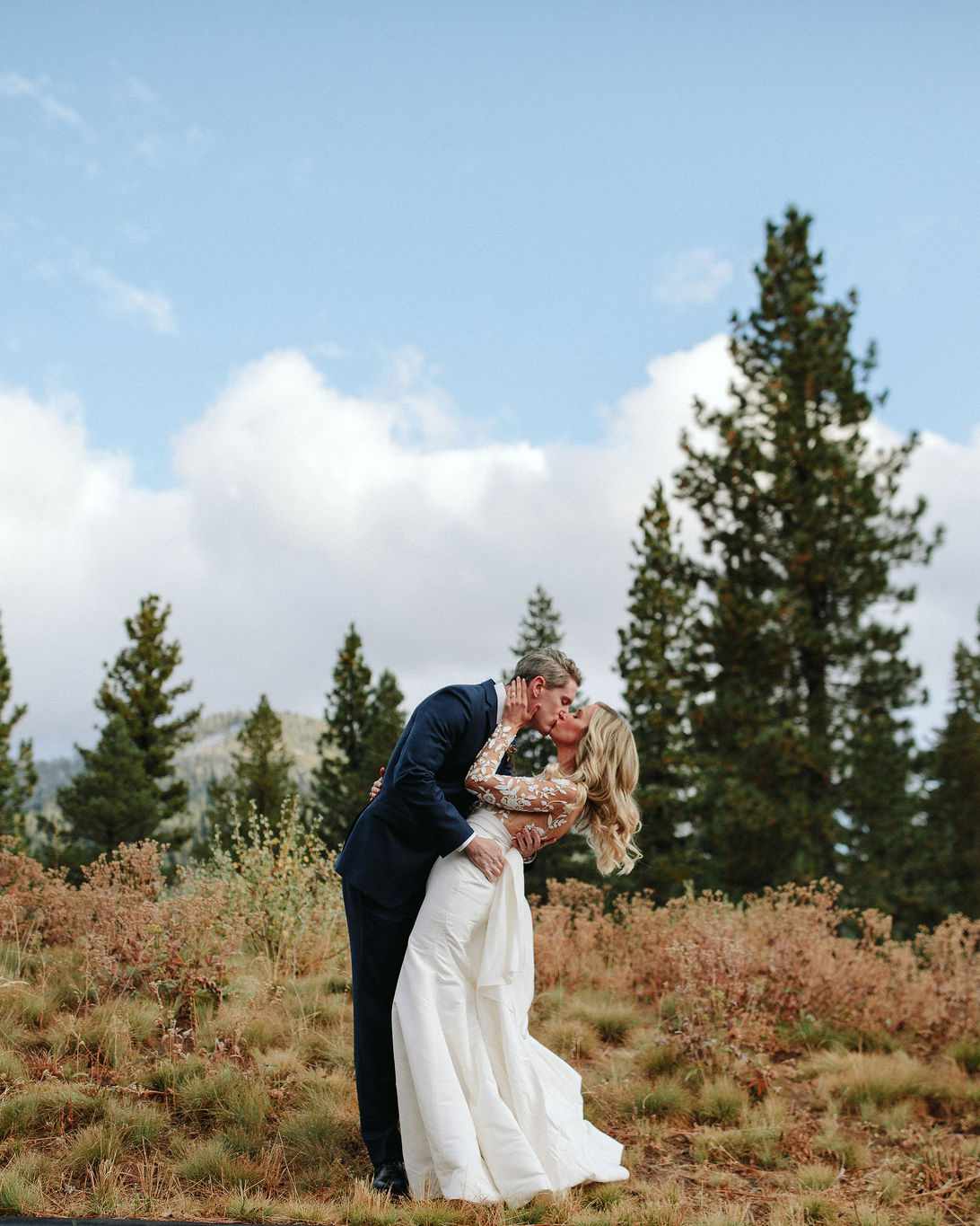 clare tim wedding couple kissing in fall setting